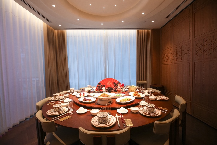 A table with plates and dishes on it

AI-generated content may be incorrect.